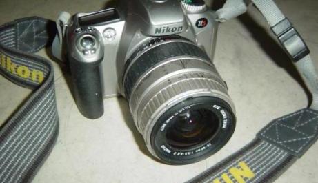 Nikon Us AF 35mm SLR Film Camera with 28-80mm Sigma MACRO Lens photo